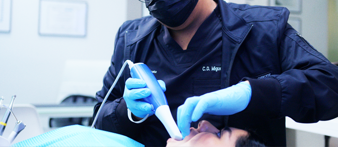 Patient smiling after receiving dental implants in Tijuana at Perio & Implants.